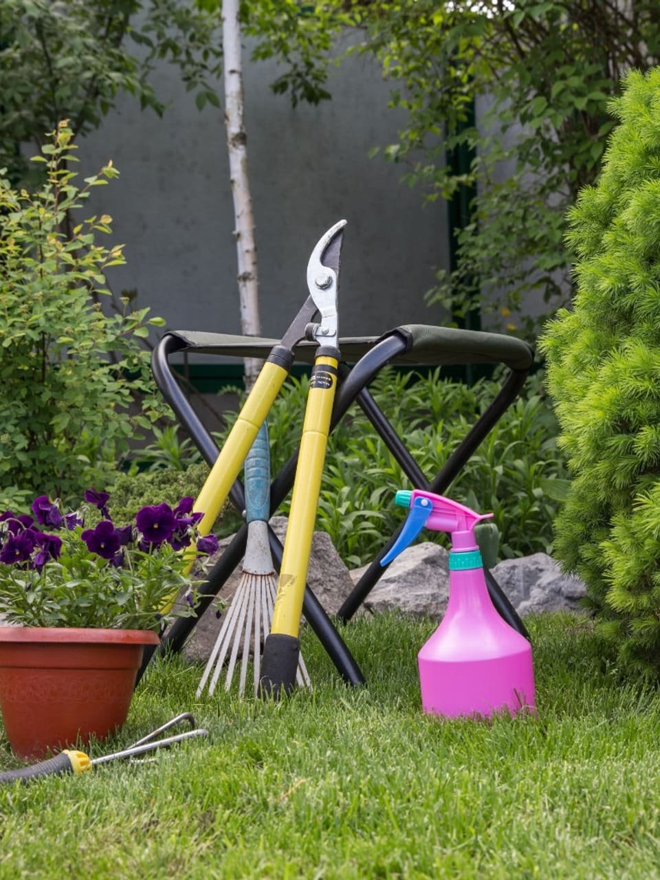 Gardening tools on a lawn